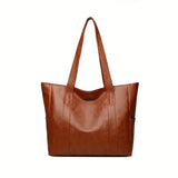Sophia's Luxe Legacy premium leather handbag shown in Coffee and Black