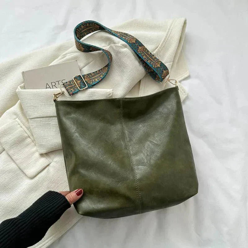 Tyla urban heritage leather shoulder bag with structured silhouette and shoulder strap