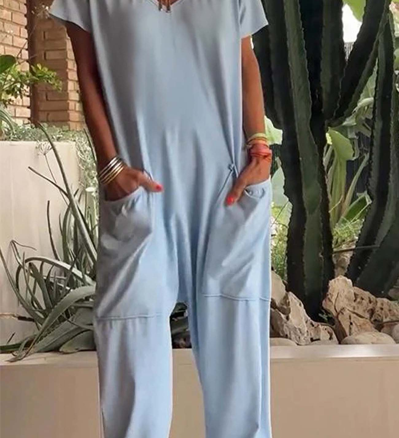 Serena relaxed-fit jumpsuit with deep V-neckline shown in a soft colourway