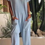 Serena relaxed-fit jumpsuit with deep V-neckline shown in a soft colourway