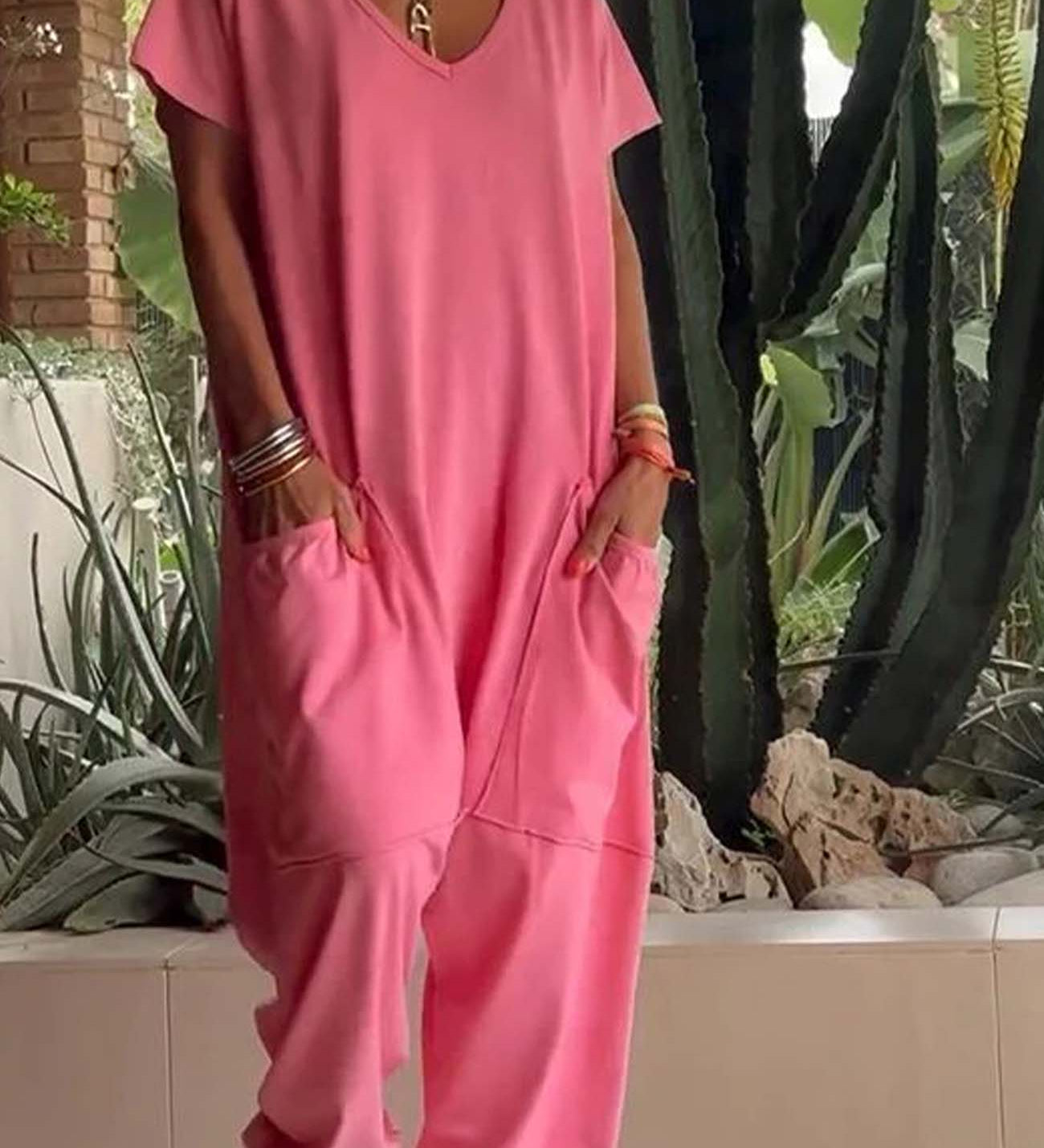Serena relaxed-fit jumpsuit with deep V-neckline shown in a soft colourway
