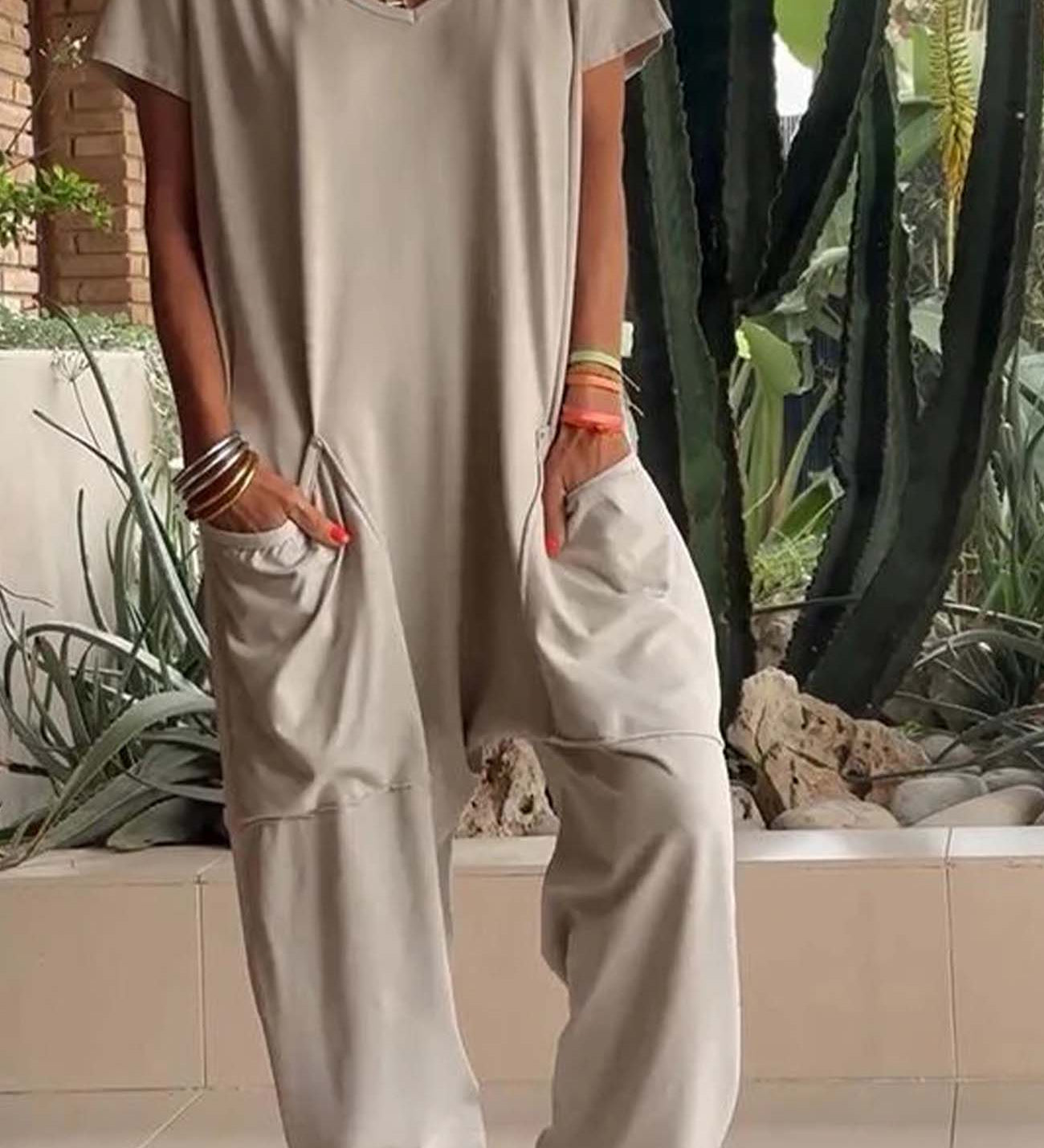 Serena relaxed-fit jumpsuit with deep V-neckline shown in a soft colourway