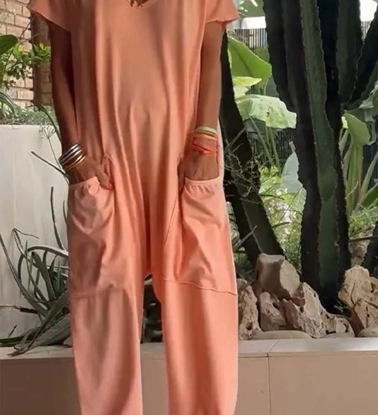 Serena relaxed-fit jumpsuit with deep V-neckline shown in a soft colourway