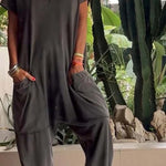 Serena relaxed-fit jumpsuit with deep V-neckline shown in a soft colourway