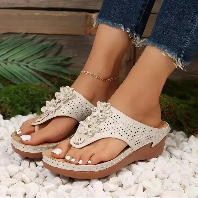 Nami orthopedic wedge sandals shown in white, blue, gold and black