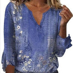Luisa floral plus size blouse with soft V-neckline and relaxed silhouette