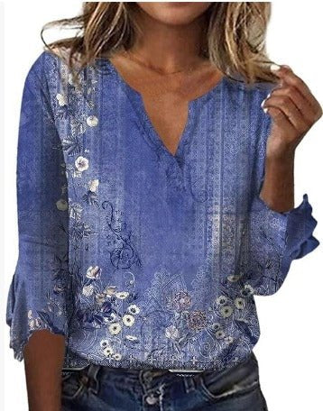 Luisa floral plus size blouse with soft V-neckline and relaxed silhouette