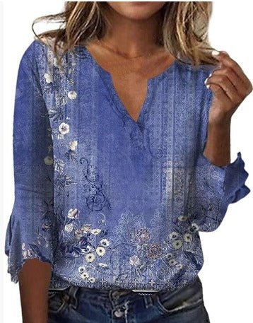 Luisa floral plus size blouse with soft V-neckline and relaxed silhouette