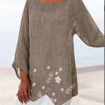 Luisa floral plus size blouse with soft V-neckline and relaxed silhouette