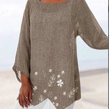 Luisa floral plus size blouse with soft V-neckline and relaxed silhouette