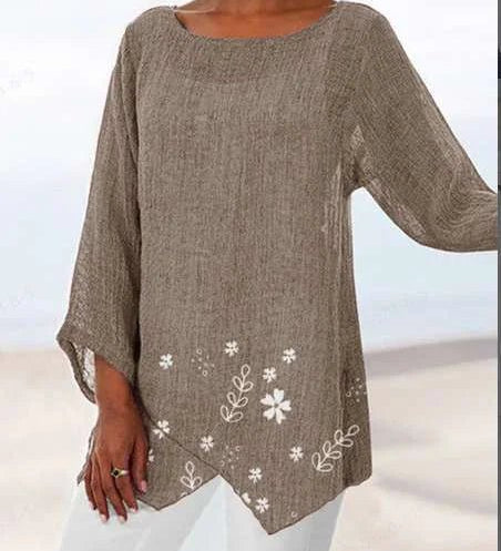 Luisa floral plus size blouse with soft V-neckline and relaxed silhouette