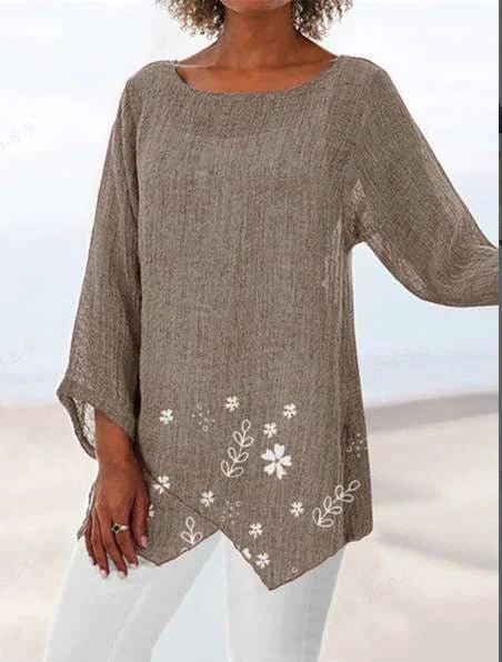 Luisa floral plus size blouse with soft V-neckline and relaxed silhouette