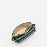 Kaya's Jewel full-grain leather shoulder bag shown in brown, blue, black and green