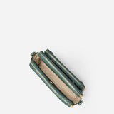 Kaya's Jewel full-grain leather shoulder bag shown in brown, blue, black and green