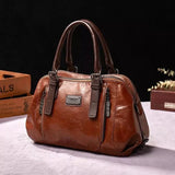 Willow signature statement handbag shown with structured silhouette and secure flap closure