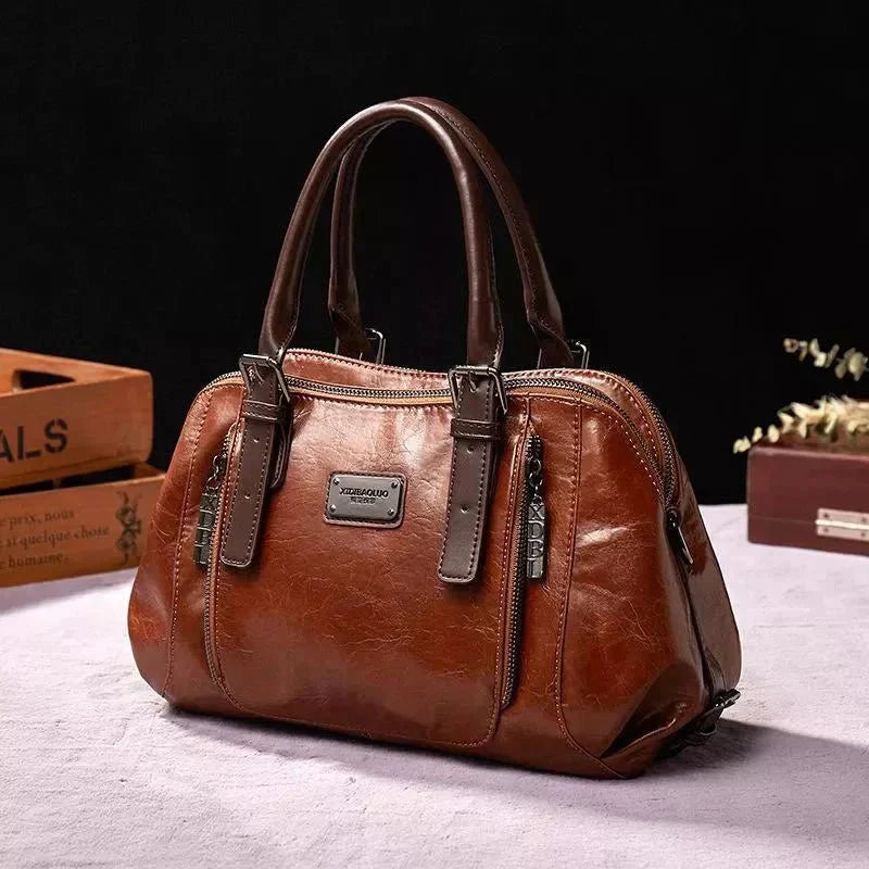 Willow signature statement handbag shown with structured silhouette and secure flap closure