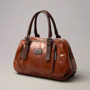 Willow signature statement handbag shown with structured silhouette and secure flap closure