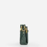 Kaya's Jewel full-grain leather shoulder bag shown in brown, blue, black and green
