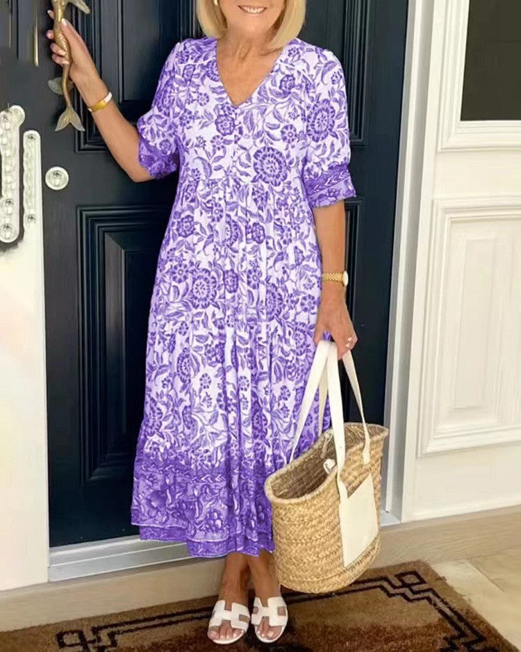 Keisha graceful V-neck floral dress shown in a soft feminine silhouette