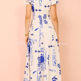 Avermy blue floral maxi dress with V-neckline and puff sleeves