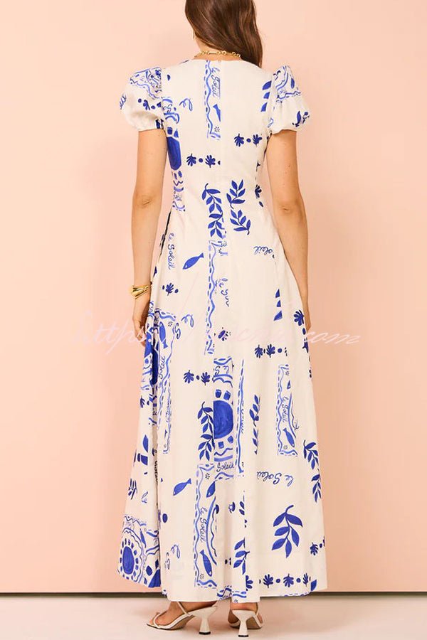 Avermy blue floral maxi dress with V-neckline and puff sleeves