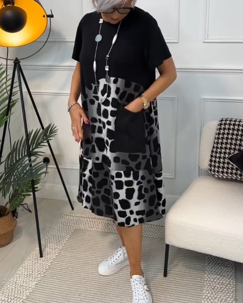 Cassandra women's elegant relaxed-fit midi dress with deep side pockets in a black and stone print