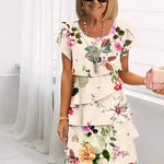 Jenna cascading floral tiered dress with flowing skirt in a soft feminine print