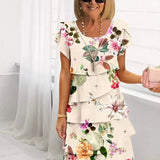 Jenna cascading floral tiered dress with flowing skirt in a soft feminine print