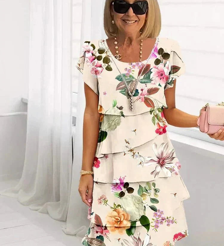 Jenna cascading floral tiered dress with flowing skirt in a soft feminine print