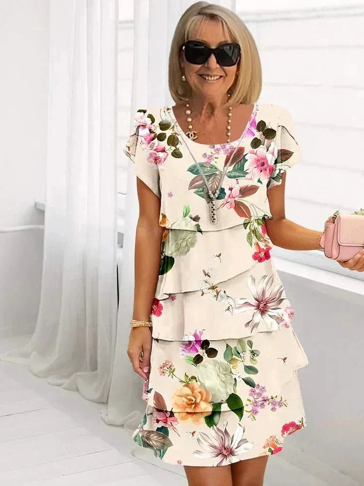 Jenna cascading floral tiered dress with flowing skirt in a soft feminine print