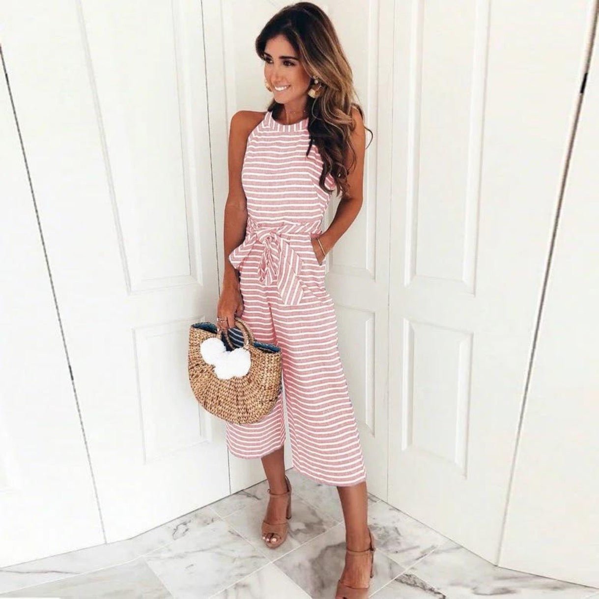 Juna striped jumpsuit shown in a relaxed, flattering one-piece silhouette