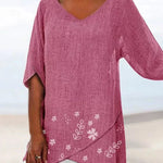 Luisa floral plus size blouse with soft V-neckline and relaxed silhouette
