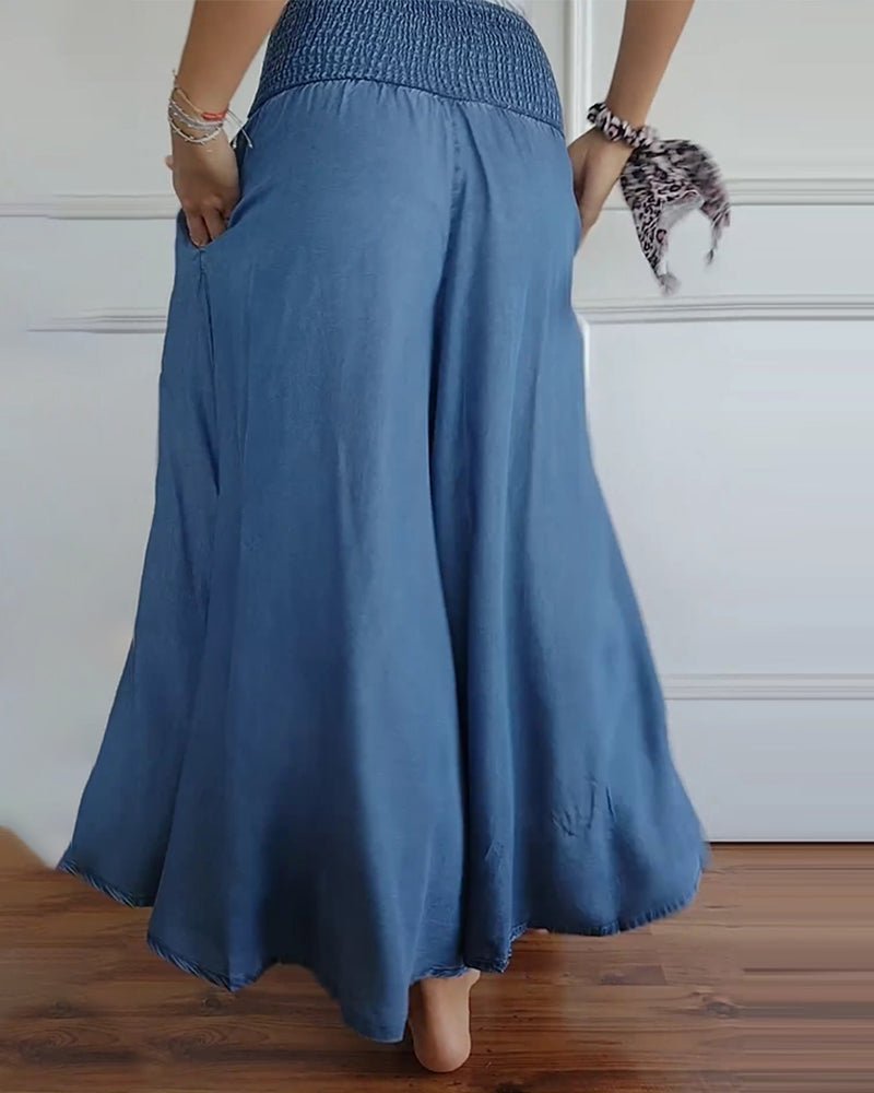 Sage flowy high-waist wide-leg pants shown in a relaxed, flattering silhouette