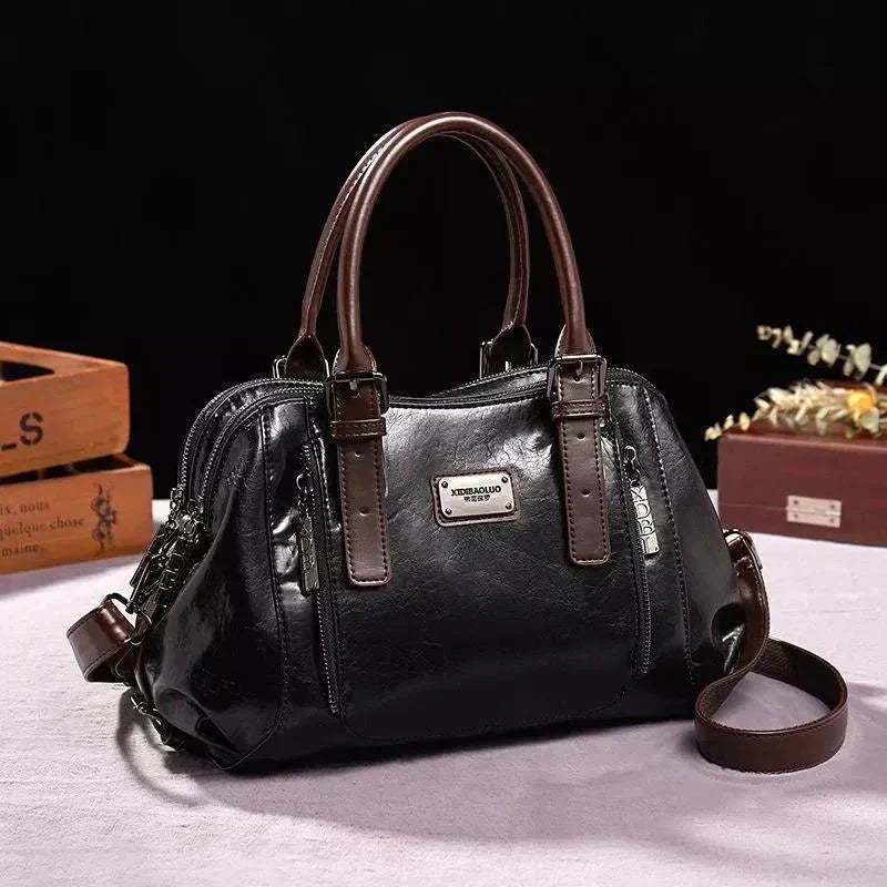 Willow signature statement handbag shown with structured silhouette and secure flap closure