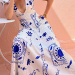 Avermy blue floral maxi dress with V-neckline and puff sleeves