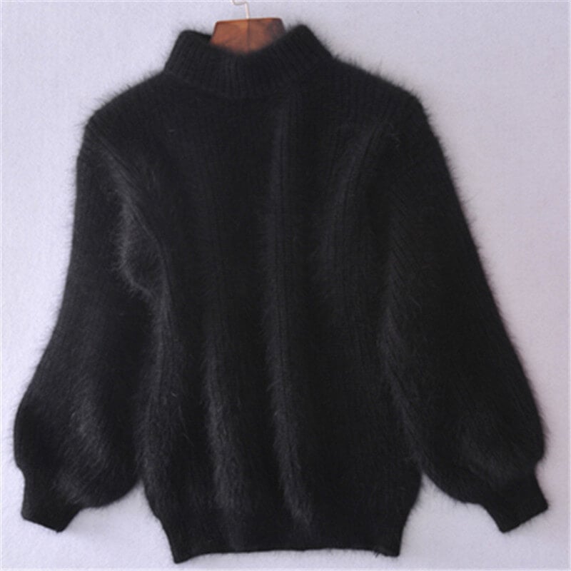 Lucia effortless soft sweater with a relaxed silhouette, shown in a neutral tone