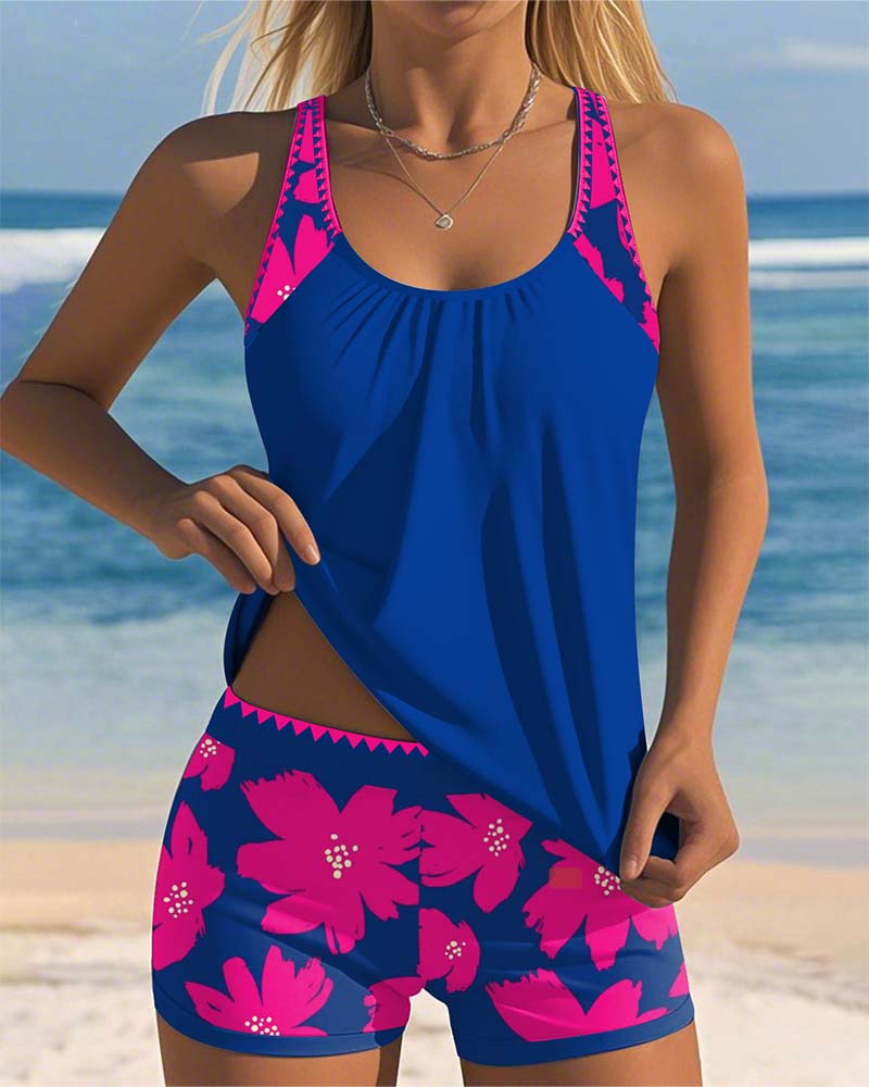 Edith sleeveless printed tankini with U-neck and open back in navy, orange and blue