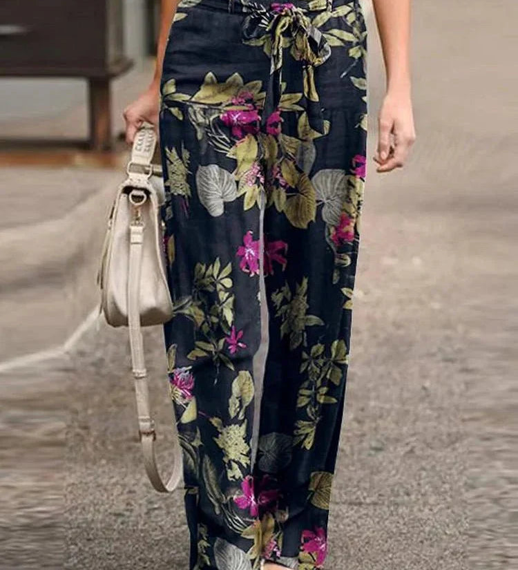 Dahlia floral print pants shown in a relaxed, everyday silhouette
