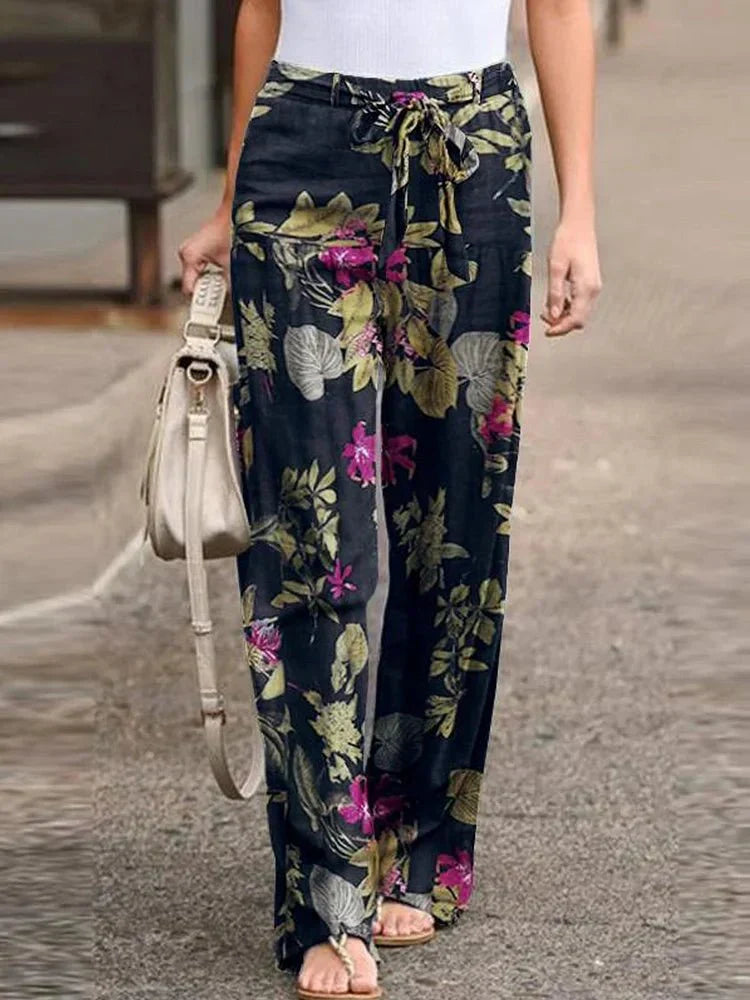 Dahlia floral print pants shown in a relaxed, everyday silhouette