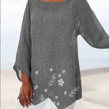 Luisa floral plus size blouse with soft V-neckline and relaxed silhouette