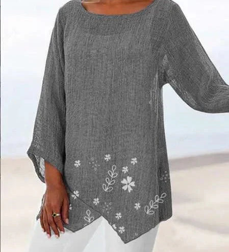 Luisa floral plus size blouse with soft V-neckline and relaxed silhouette