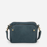 Kaya's Jewel full-grain leather shoulder bag shown in brown, blue, black and green
