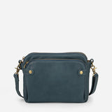 Kaya's Jewel full-grain leather shoulder bag shown in brown, blue, black and green