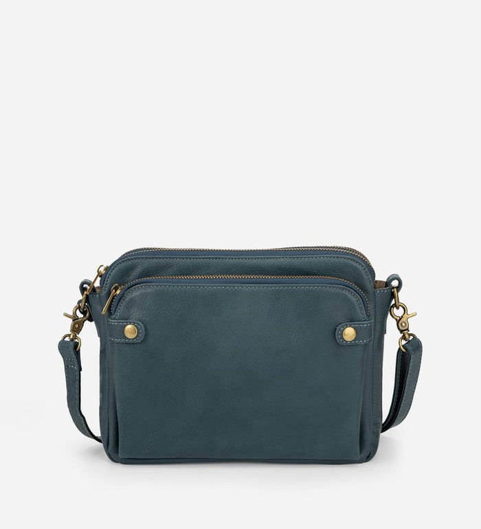 Kaya's Jewel full-grain leather shoulder bag shown in brown, blue, black and green