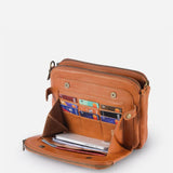 Kaya's Jewel full-grain leather shoulder bag shown in brown, blue, black and green
