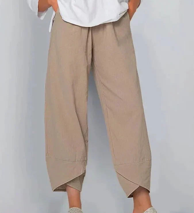 Avelina relaxed chic pants with a mid-rise waist and flowing silhouette, shown in neutral tones