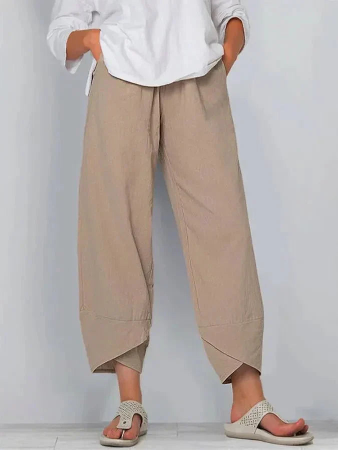 Avelina relaxed chic pants with a mid-rise waist and flowing silhouette, shown in neutral tones