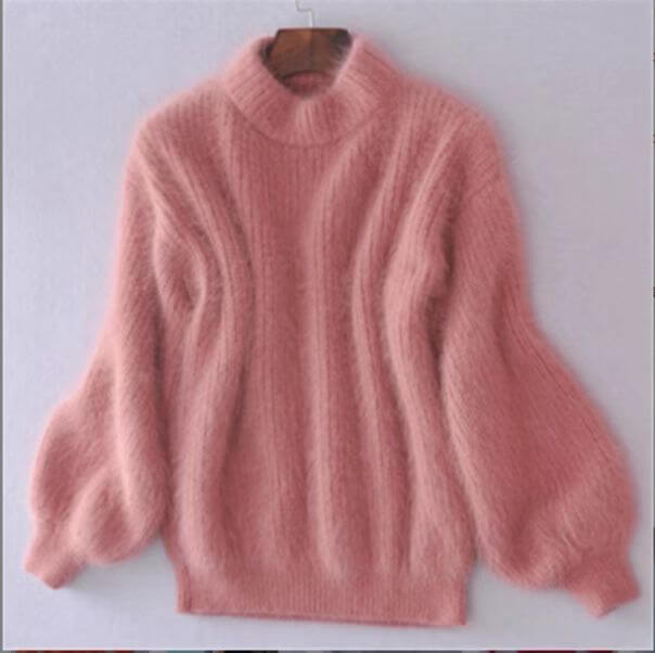 Lucia effortless soft sweater with a relaxed silhouette, shown in a neutral tone