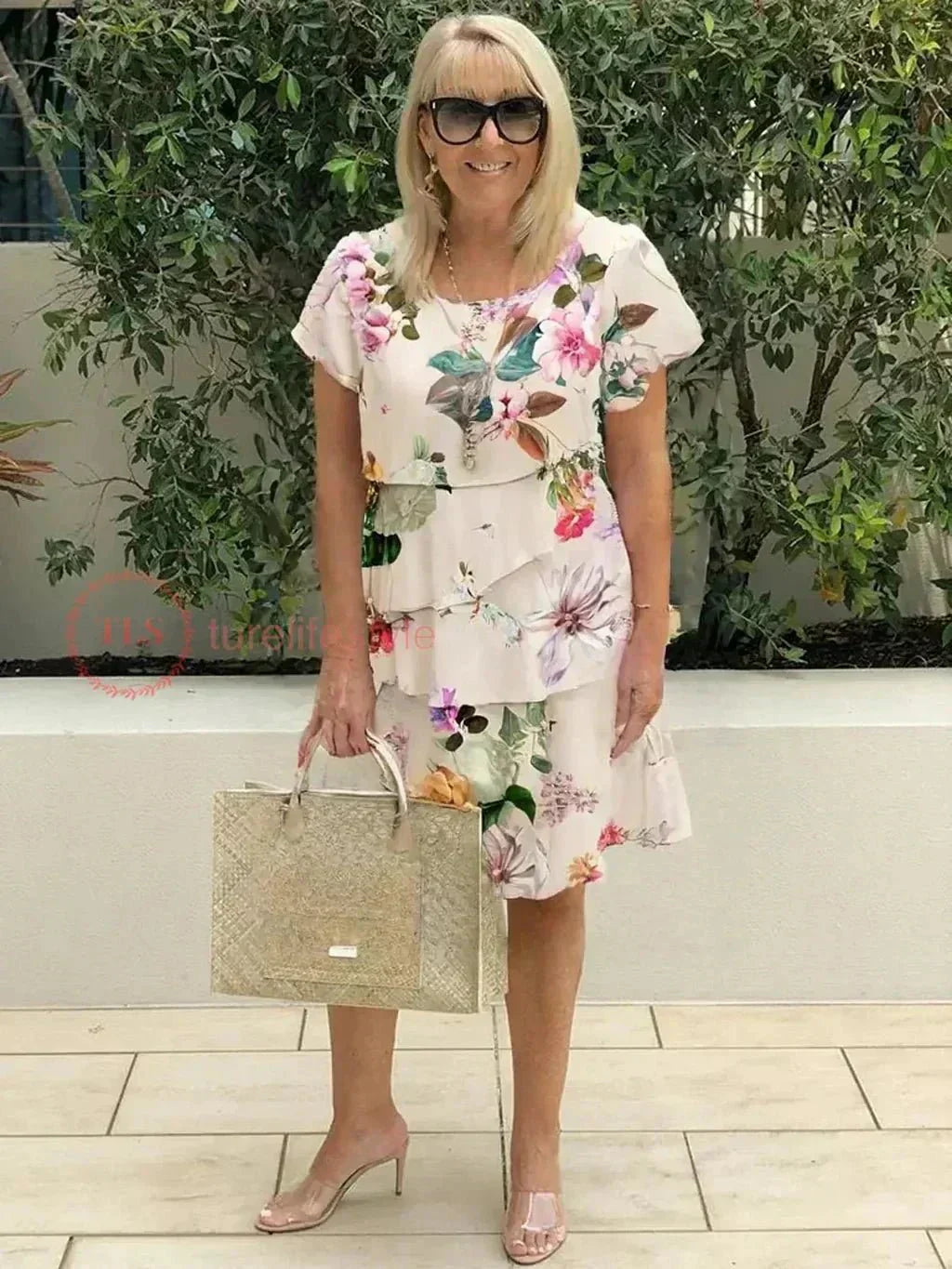 Jenna cascading floral tiered dress with flowing skirt in a soft feminine print
