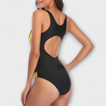 Agnes sporty one-piece swimsuit with cut-out detail and diagonal slimming stripes